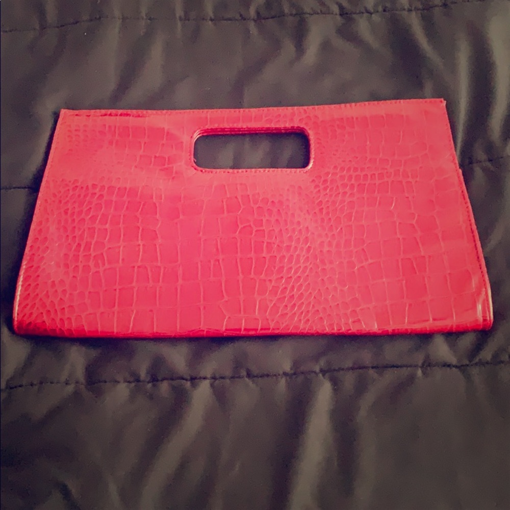 Red snake skin clutch